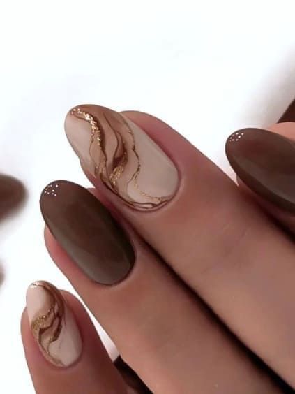 Chic Earthy Nail Design with Brown, Beige, and Glamorous Gold Accents.