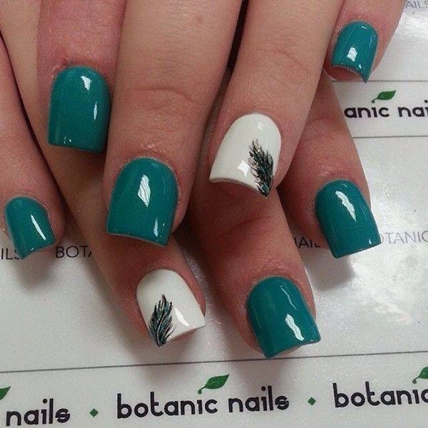 Teal and White Nail Design with Elegant Leaf Motifs for a Botanical Aesthetic.