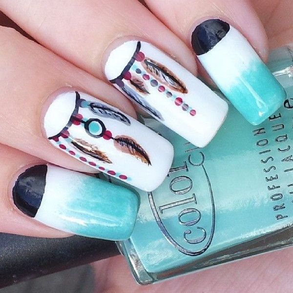 Bohemian Dreamcatcher-Inspired Nail Art with Gradient Blues and Intricate Details.