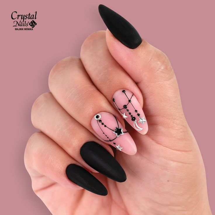 Celestial-Inspired Matte Black and Soft Pink Nail Design with Intricate Constellation Pattern