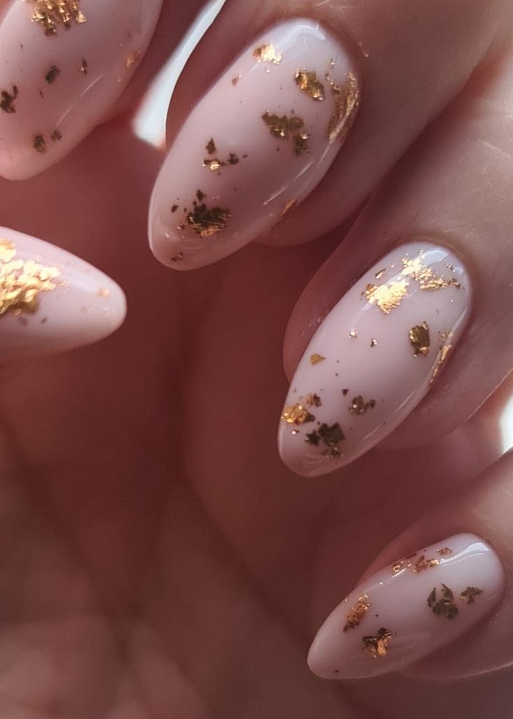 Chic Pink and Gold Foil Almond Nail Design for Elegant Occasions