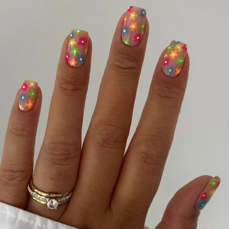 Vibrant Pastel Floral Nail Design for a Playful Summer Look.