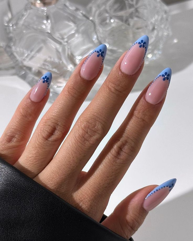 Elegant Pink and Blue Nail Design with Floral Accents