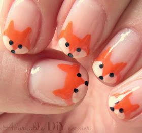 Adorable Fox Face Nail Design: Playful and Whimsical Charm for Animal Lovers.