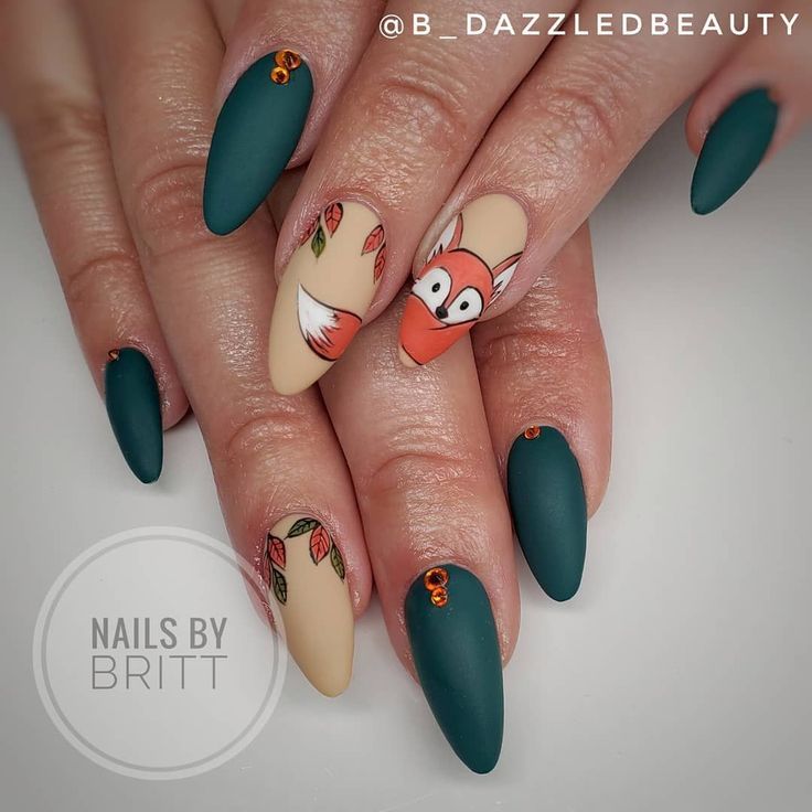 Charming Fall-Inspired Nail Design with Matte and Glossy Finishes, Rich Green and Beige Accents, Whimsical Fox Illustration, and Sparkling Rhinestones