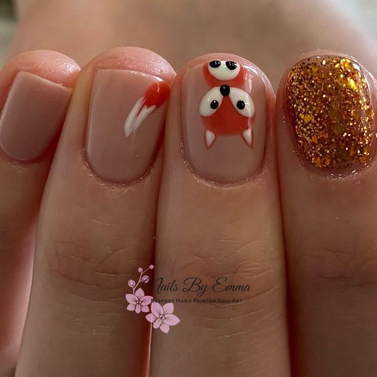 Charming Playful Fox Nail Art with Sparkly Gold Accents