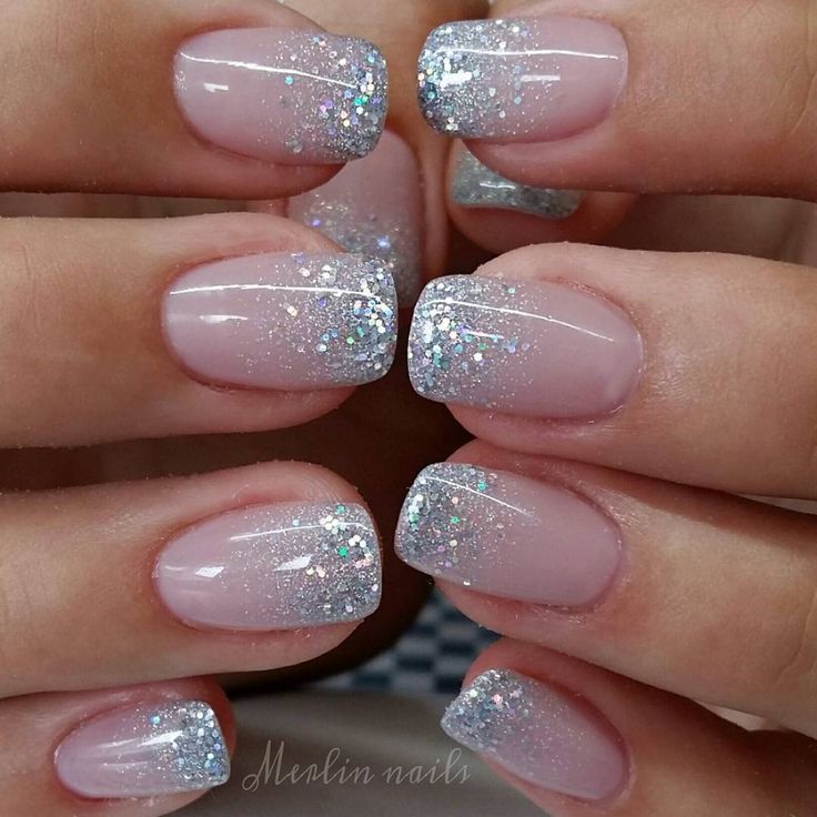 Glamorous Elegant Ombre Nail Design: Soft Pink to Sparkling Silver Gradient.