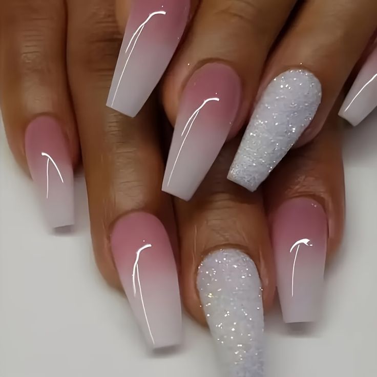 Elegant Gradient Nail Design with Soft Pink Base, White Tips, and Glitter Accent.