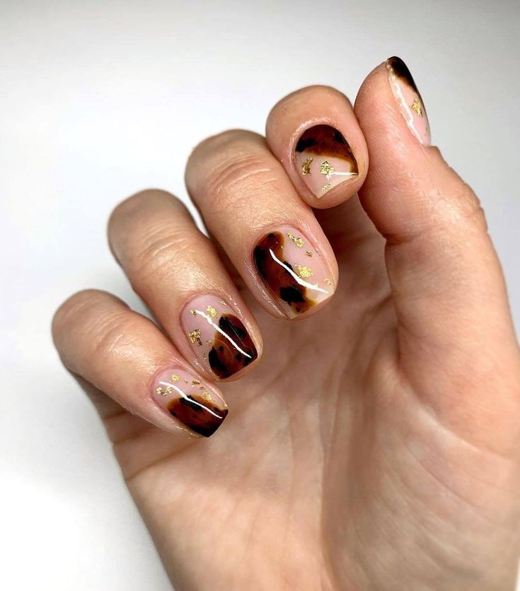 Elegant Tortoiseshell Nail Design with Warm Browns, Nude Tones, and Gold Accents.