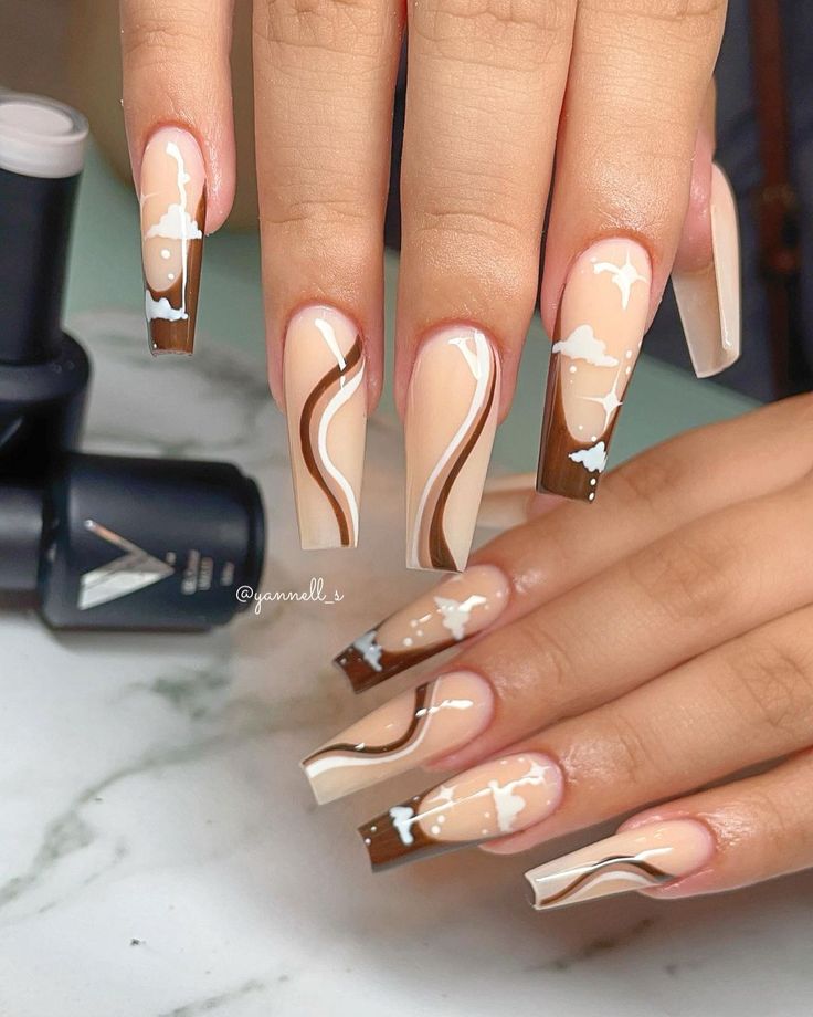 Elegant Nail Design: Neutral Tones with Playful Swirls for Any Occasion.