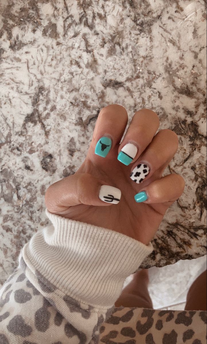 Sporty Turquoise and White Nail Art for Youthful Self-Expression.