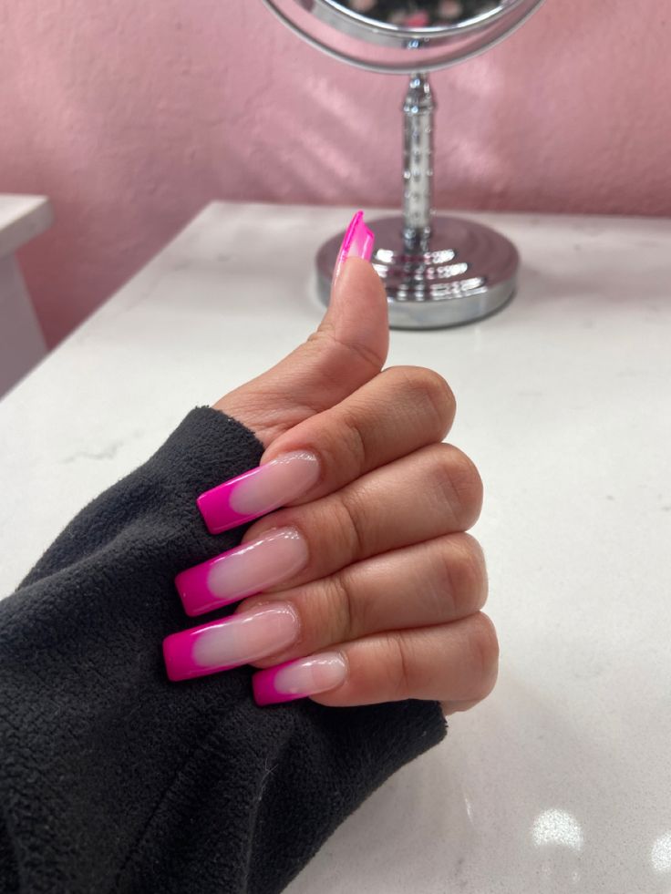 Trendy Ombre Nail Design: Playful Light Pink to Bold Fuchsia Transition on Long Square Nails