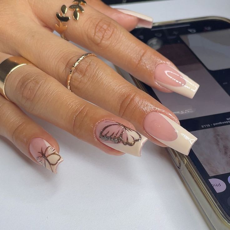 Sophisticated Nude and Pale Pink Nails with Whimsical Butterfly Accent.