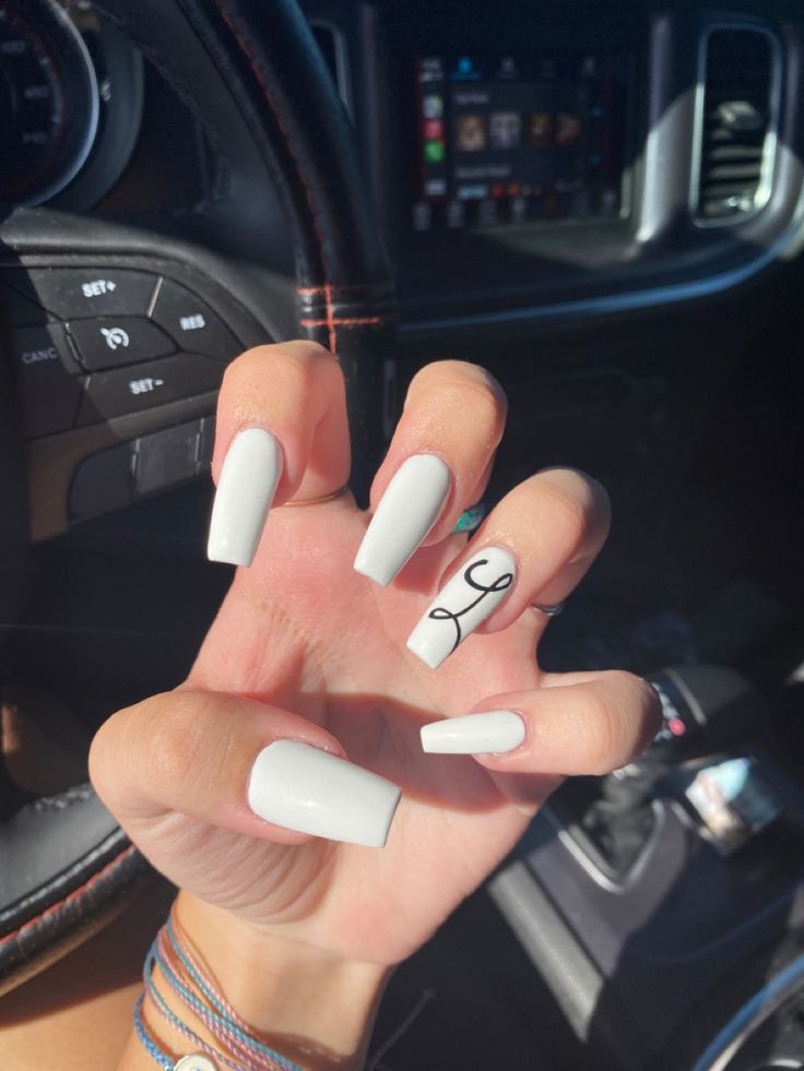 Elegant Glossy White Nails with Artistic Black Line Accent Design.