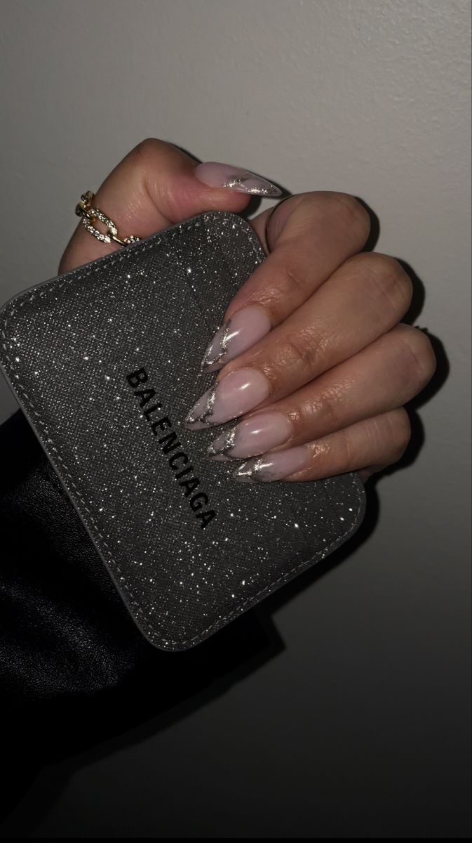 Chic Nude Nail Design with Shimmering Silver Tips for a Glamorous Look