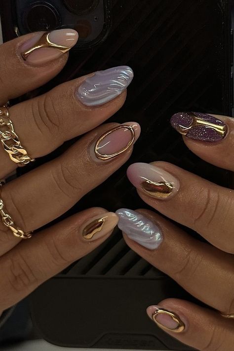 Sophisticated Pastel Nail Design with Glossy Finishes and Elegant Gold Accents.