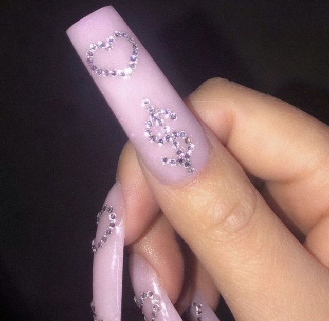 Chic Soft Pink Nail Design with Rhinestones and Playful Motifs