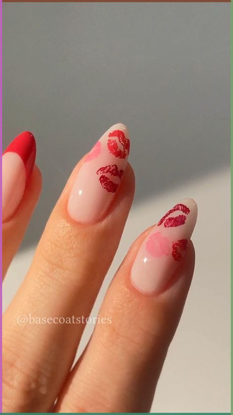 Playful Lip Print Nail Design: A Fun Fusion of Soft Nude and Bold Red.