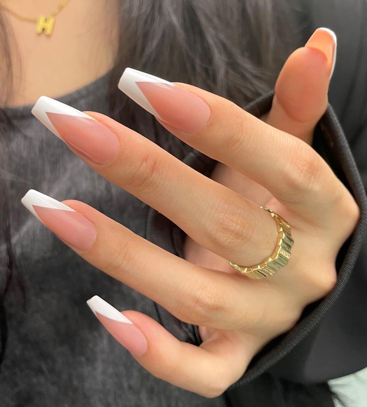 Chic Almond-Shaped Nails with Nude Base and White Tips: A Modern French Twist