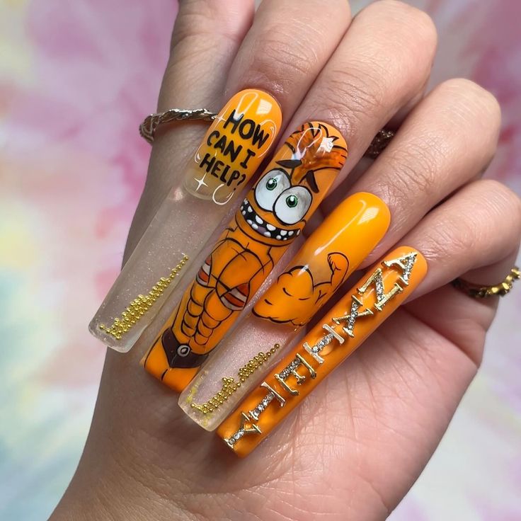 Vibrant Cartoon-Inspired Nail Art with Bright Orange Hues and Playful Designs