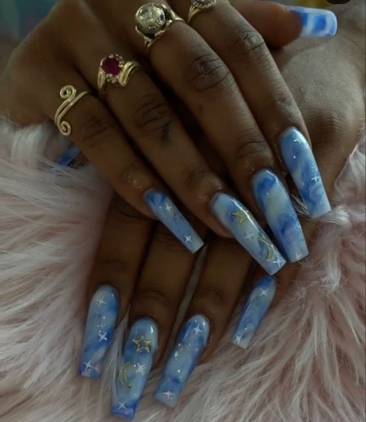 Dreamy Sky-Themed Nail Design with Gradient Blues and Whimsical Details