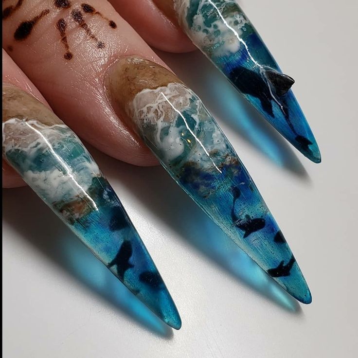 Intricate Ocean-Inspired Nail Art with Waves and Marine Life Designs