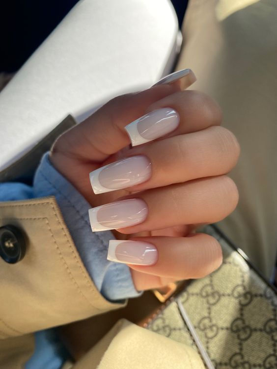 Sophisticated French Manicure: Timeless Elegance for Any Occasion.