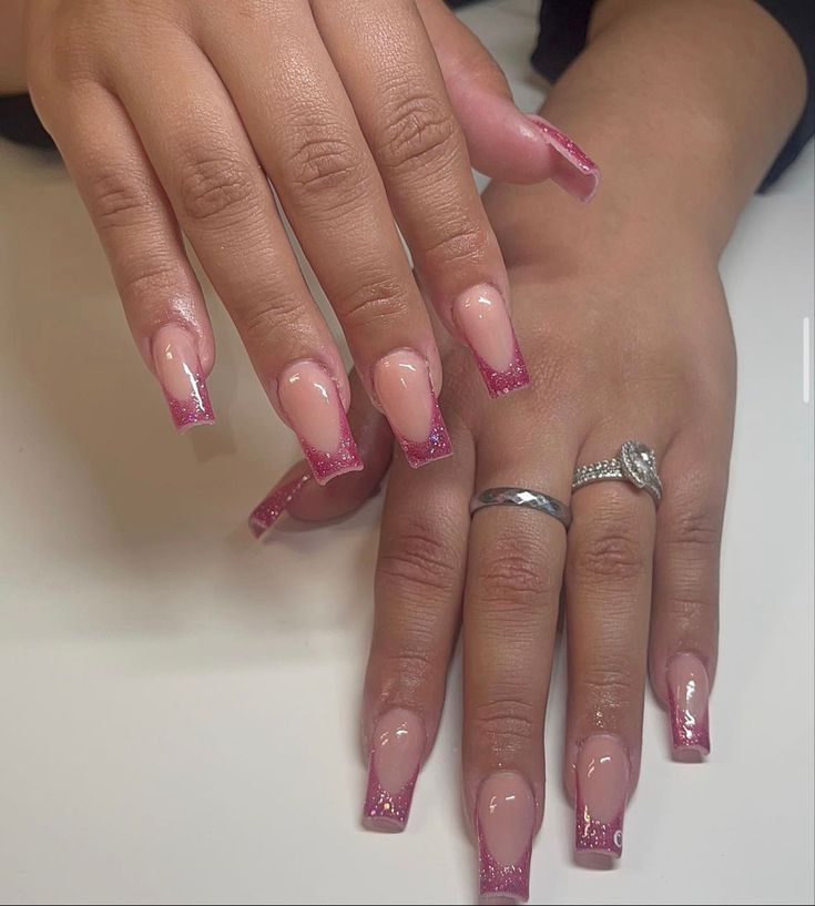 Chic Clear Pink Base Nail Design with Glitter Tips for Elegant Occasions