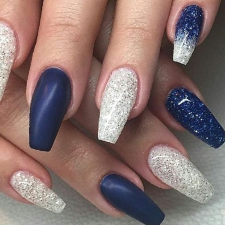 Elegant Navy and Silver Matte Glitter Nail Design: A Striking Combination for Any Occasion.