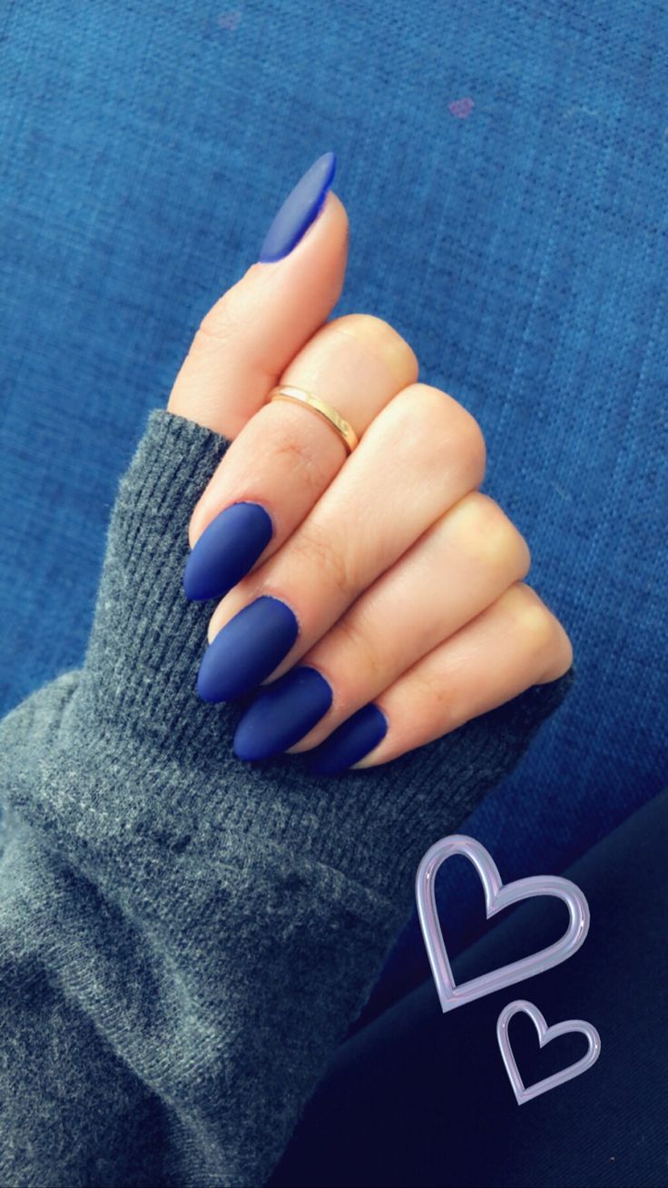 Sophisticated Elegant Matte Navy Nails with Almond Shape and Gold Ring Accents.