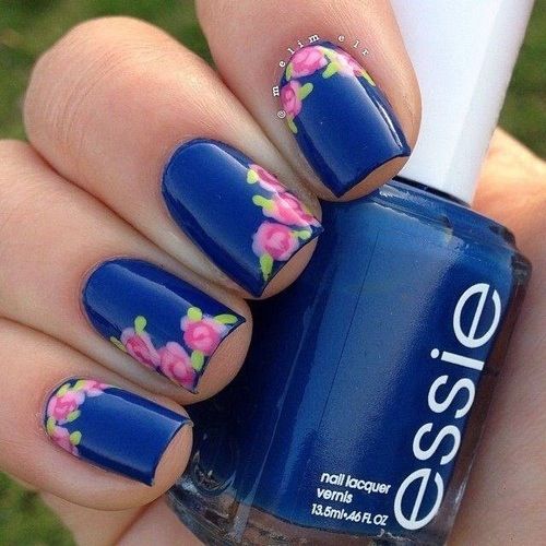 Elegant Floral Nail Design: Deep Navy Base with Delicate Pink Roses