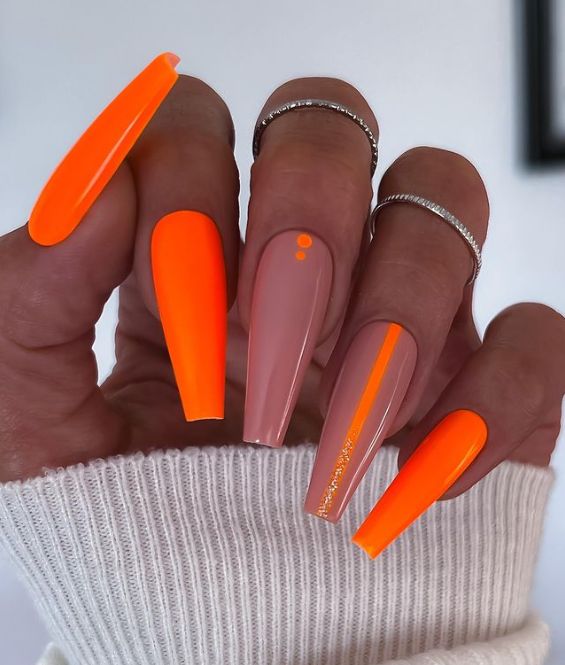 Bold Neon and Nude Nail Design: A Playful Blend of Elegance and Fun