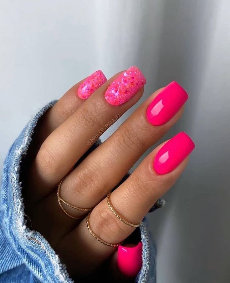 Bold and Fun Vibrant Pink Nail Design with Glossy and Glittery Accents