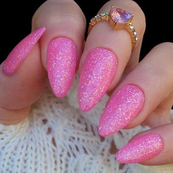 Vibrant Sparkling Pink Almond Nails: Glamorous and Sophisticated Elegance