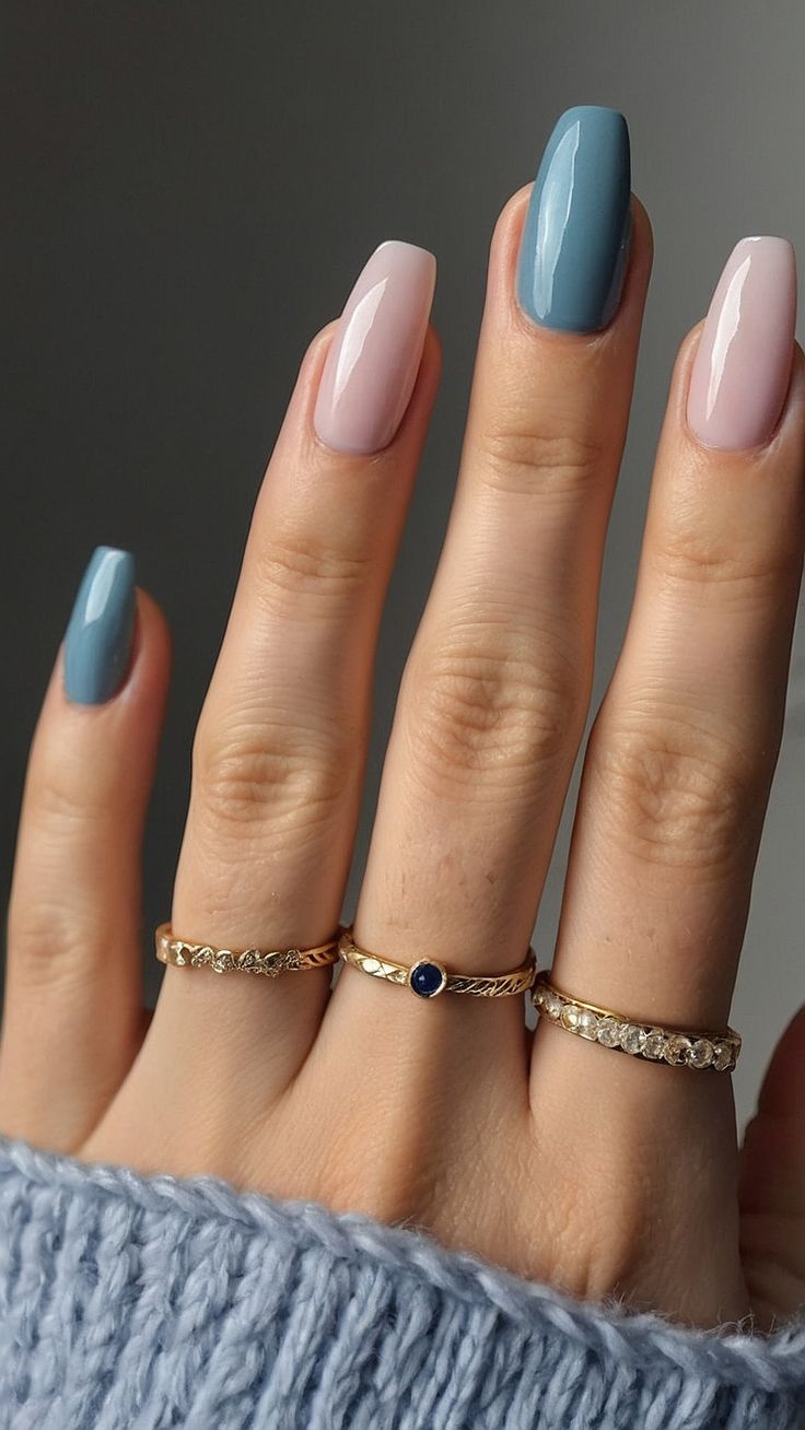 Chic Pastel Pink and Soft Blue Nail Design with Glossy Finish and Gold Accents.