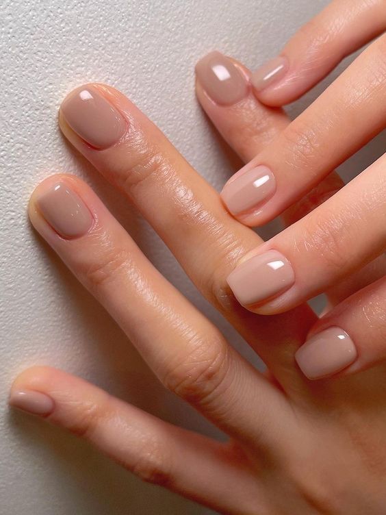 Elegant Subtle Nude Nail Design: A Harmonious, Glossy Finish for Any Occasion