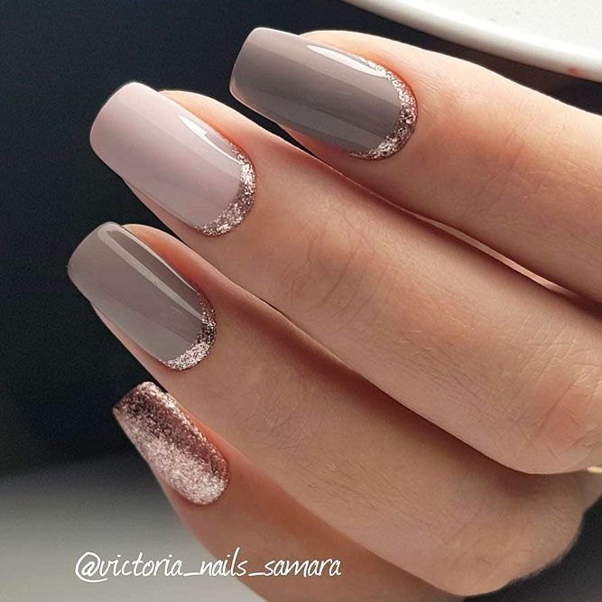 Sophisticated Nail Design Blends Muted Pinks and Rich Taupes with Glittery Accents for Chic Elegance.