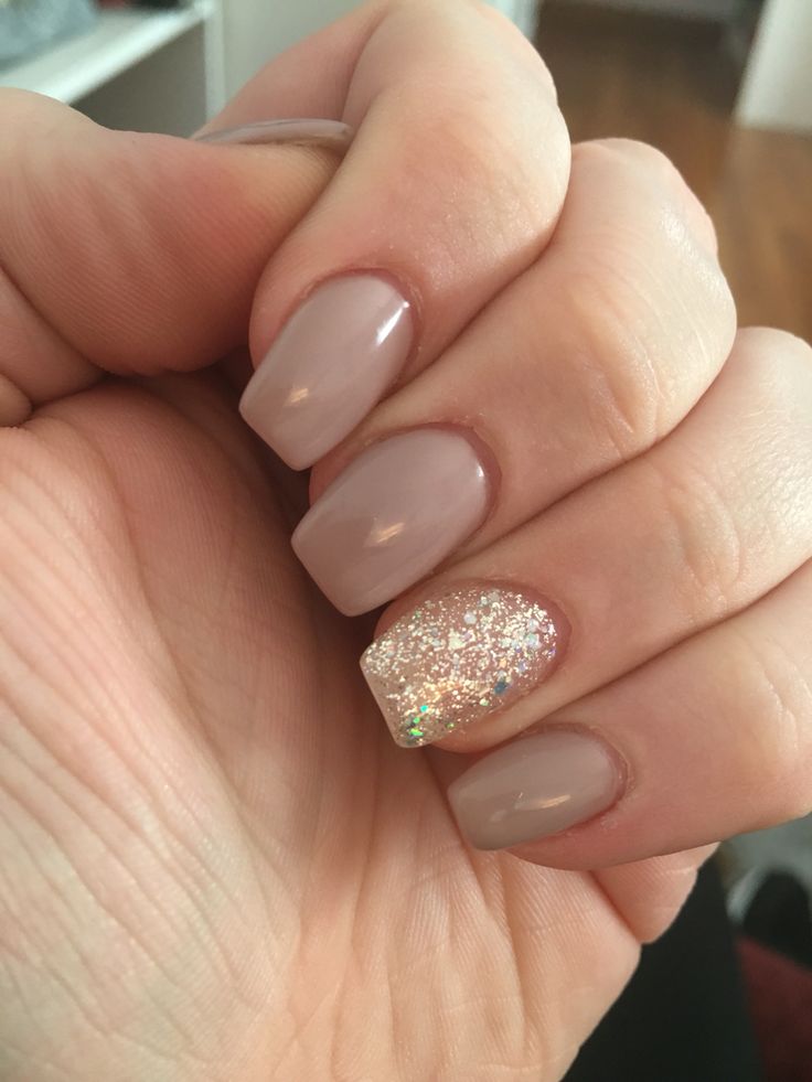 Elegant Nude Nail Design with Sparkling Glitter Accent for Every Occasion