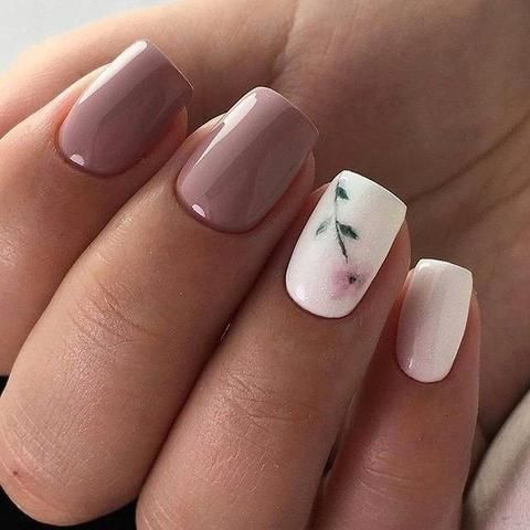 Sophisticated Nail Design with Soft Colors and Floral Accents