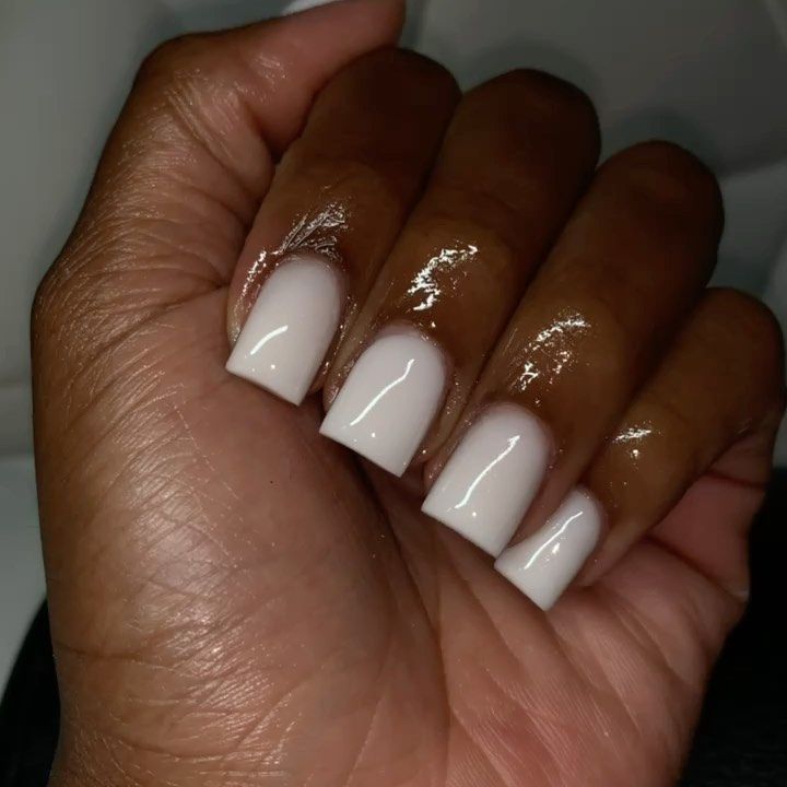 Elegant Almond-Shaped Nails with Subtle Ombre in Creamy White