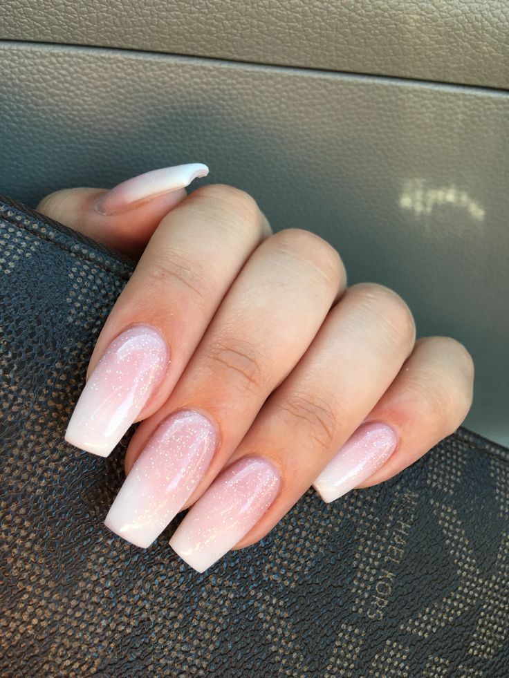 Elegant Gradient Nail Design with Sparkling Accents and Tapered Tips