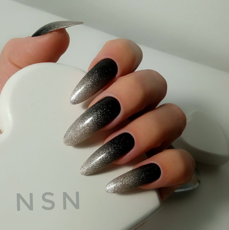 Elegant Ombre Stiletto Nails: Striking Black and Silver Gradient Design