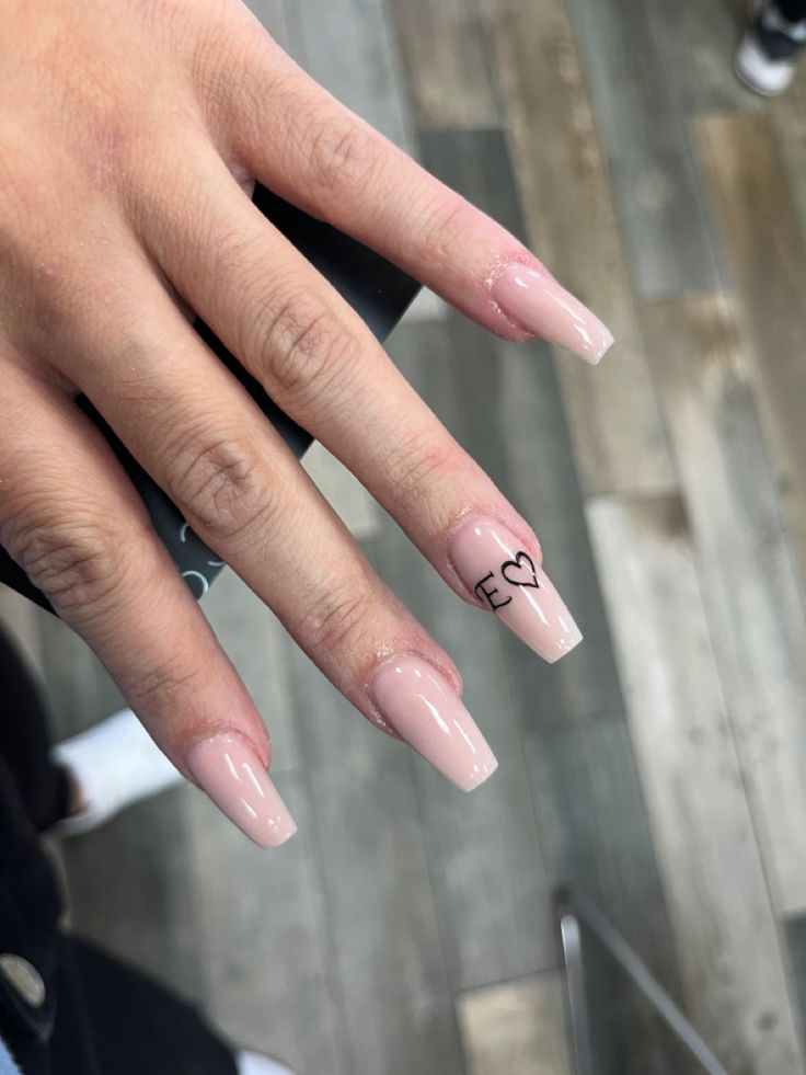 Chic Nude Manicure with Glossy Finish and Minimalist Artwork on Long Square Nails