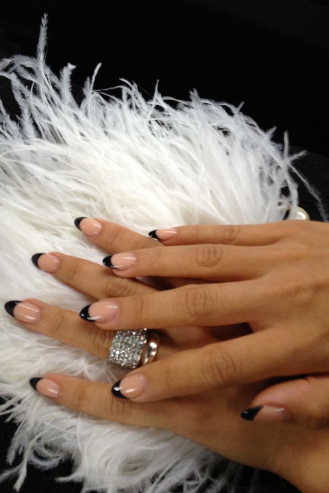 Chic Nude and Black Tip Nail Design: A Modern Statement of Sophistication.