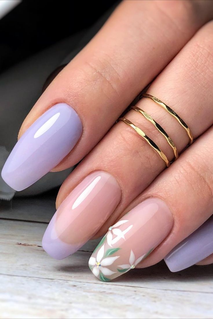 Elegant Pastel Nail Design with Floral Accents and Minimalist Gold Rings.