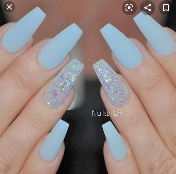 Serene Soft Blue Matte Nails with Glamorous Glitter Accents for a Sophisticated Look.