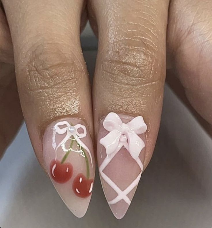 Charming Cherry and Bow Nail Design with Soft Pink Elegance