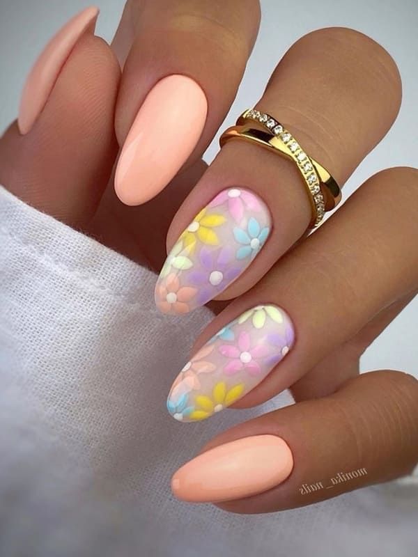 Pastel Floral Nail Design: Soft Peach with Cheerful Yellow and Blue Accents for a Fresh Spring/Summer Look.