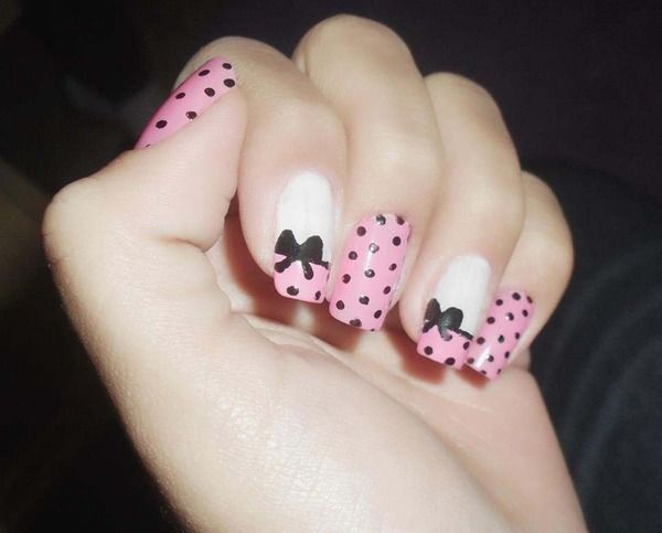 Whimsical Pink and White Nail Design with Polka Dots and Bows