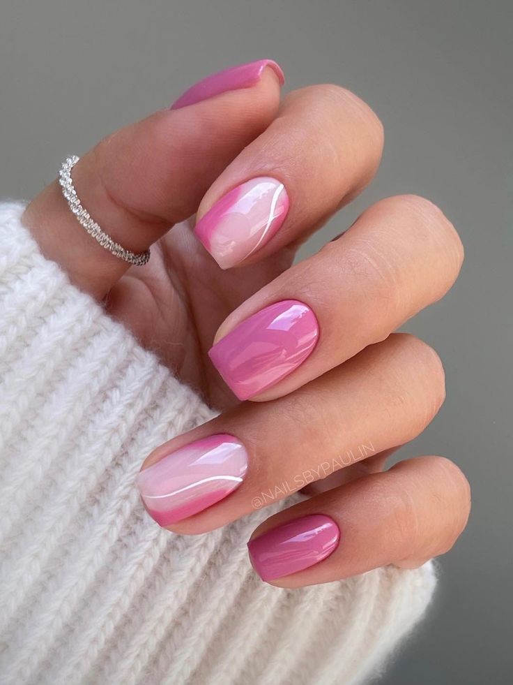 Elegant Pink Nail Design: Glossy and Matte Finishes with Marble Accent